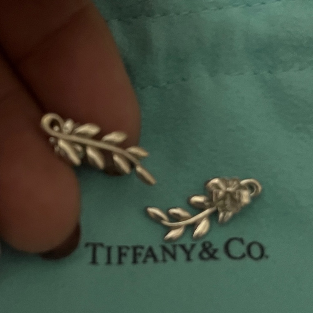 The Tiffany & Co. Paloma Picasso Silver Olive Leaf Climber Stud Earrings